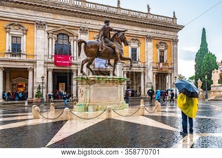 Rome, Italy - November 04 2018: Bronze Equestrian Statue/ Monument Of Marcus Aurelius In Front Palaz