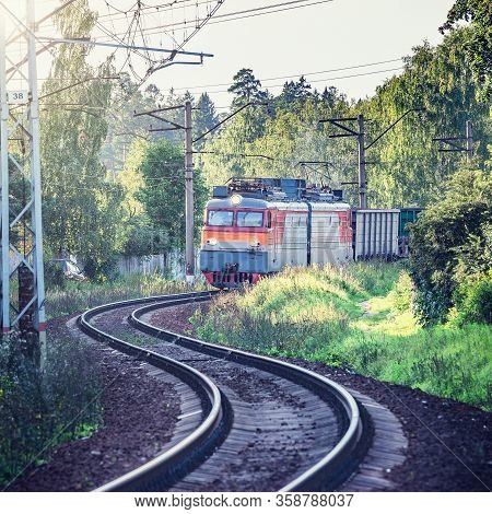 Freight Train Moves At Summer Day Time.