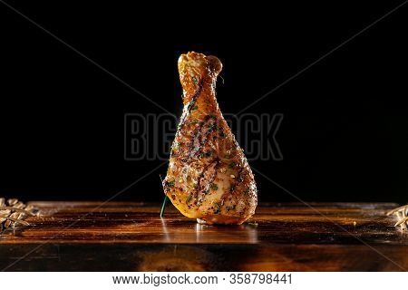 Fresh Grilled Juicy Chicken Leg On A Platter.