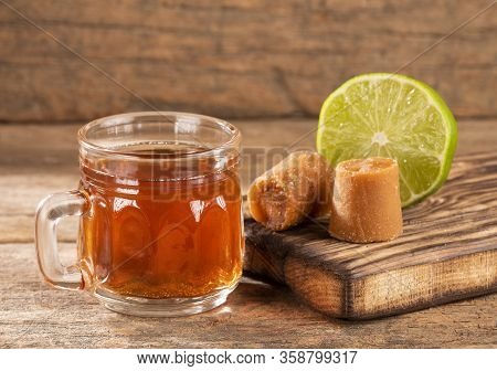 Fresh Homemade Aguapanela, Agua De Panela Or Aguadulce, A Popular Latin American Sweet Drink Made Of
