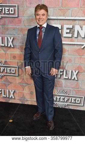 LOS ANGELES - FEB 20:  Art Bonilla {Object} arrives for Netflixâs âGentefiedâ Premiere on February 20, 2020 in Los Angeles, CA