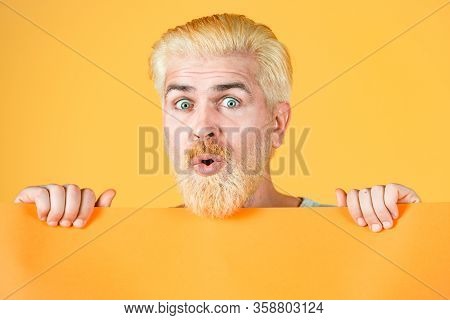 Close Up Portrait Of Funny Man Showing Blank Signboard With Copyspace Area For Slogan Or Text