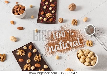 Raw Vegan Handmade Chocolate With Nuts. Chocolate Bars And Inscription 100 Natural Made Of Cocoa Pow