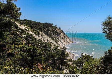 Hiking in picturesque places on the wild beach and camping. The outskirts of the resort of Gelendzhik and the neighboring city of Novorossiysk. Black sea coast