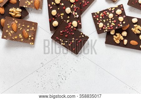 Variety Of Dark And Milk Chocolate Bars With Nuts And Dried Fruits. Handmade Organic Chocolate. Top 