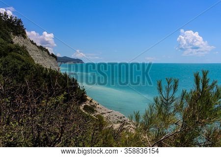 Sosnovka, a picturesque wild beach at the foot of the rocks in the vicinity of the resort of Gelendzhik. Black sea coast