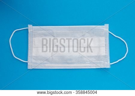 Surgical Medica Whitel Mask On A Blue Background