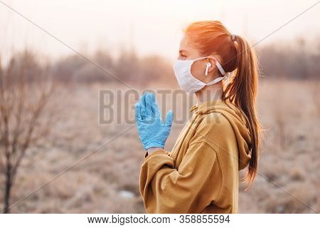 Covid-19 Pandemic Coronavirus Girl In Mask And Blue Gloves During Quarantine