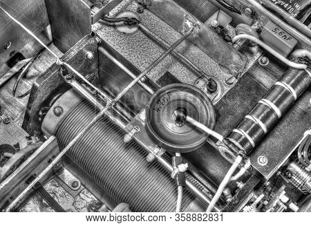 Inside View Of High Frequency Power Amplifier With Capacitors, Coils And Other Components In Black A