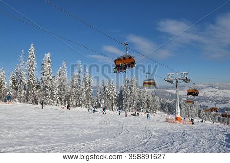 Bialka Tatrzanska, Poland - January 11, 2019: Skiers Ski On The Ski Slope In Popular Winter Resort K