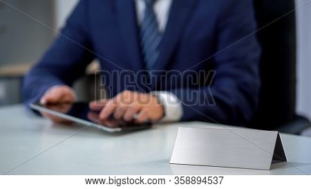 Business Man Typing On Tablet Pc, Work Place, Blank Nameplate Template For Text