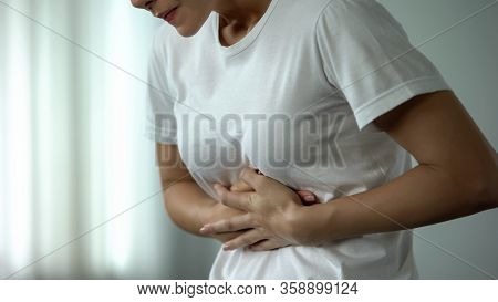 Young Woman Touching Belly, Suffering From Sharp Stomach Ache, Gastritis, Health
