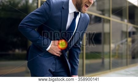 Office Manager Feels Sharp Abdominal Pain, Indigestion, Spot Indicates Heartburn