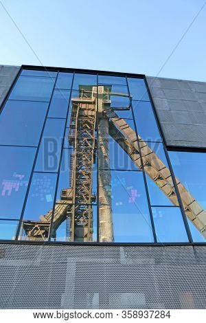 Headframe Of C-mine In Belgium Reflected In Glass