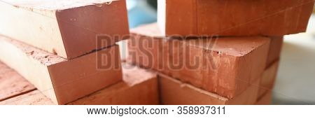 Building Materials Are On Floor, Stack Red Bricks. Production High-quality Ceramic Brick Matte, Redd