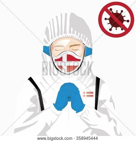 Covid-19 Or Coronavirus Concept. Danish Medical Staff Wearing Mask In Protective Clothing And Prayin