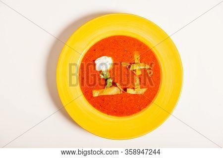 Seasoned Tomato Soup With Avocado And Decorations