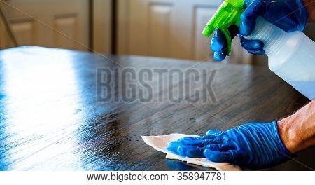 Stay Inside And Stay Safe And Clean For The Virus , Wiping Down Surfaces And Disinfecting Table Duri