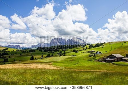 Alpe Di Siusi With Sella And Langkofel Group Mountains In The Background