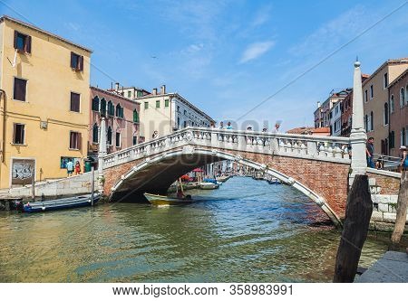 Venice, Italy - June 15, 2016 View Of The Ponte Delle Guglie Bridge Of Spires Over The Canaregio Can