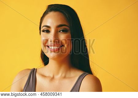 Headshot Beauty Shot Of Hispanic Latina Woman Smiling Young Adult With Black Long Hair And Tank Top 