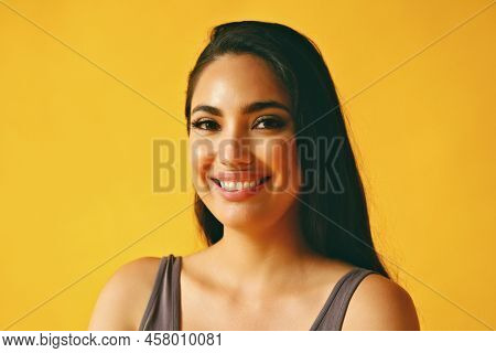 Headshot Beauty Shot Of Hispanic Latina Woman Smiling Young Adult With Black Long Hair And Tank Top 