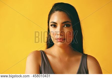 Headshot Beauty Shot Of Hispanic Latina Woman Thoughtful Young Adult With Black Long Hair And Tank T