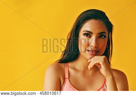 Headshot Beauty Shot Of Thoughtful Hispanic Latina Woman Hand On Chin Young Adult With Black Long Ha