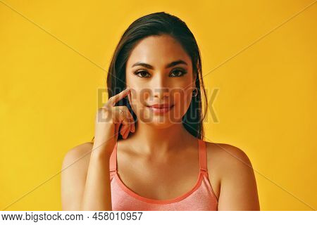 Headshot Beauty Shot Of Thoughtful Smart Hispanic Latina Woman With Hand On Chin Young Adult With Bl