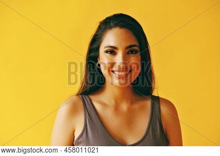 Headshot Beauty Shot Of Hispanic Latina Woman Smiling Young Adult With Black Long Hair And Tank Top 