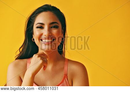 Headshot Beauty Shot Of Hispanic Latina Woman With Hand On Chin Toothy Smile Young Adult With Black 