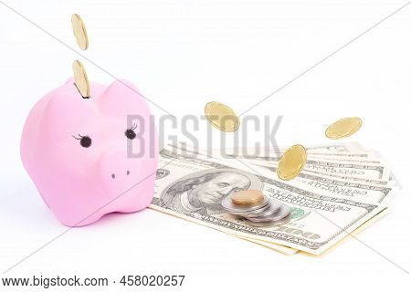 Gold Towers Made Out Of Gold And Silvery Coins, Stack Isolated On White Background. Coins Falling In