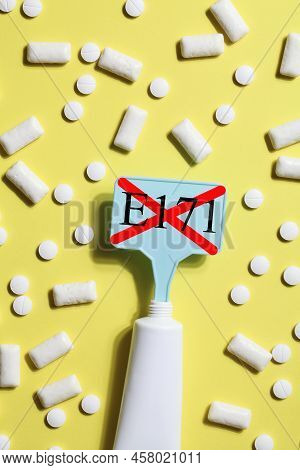 Titanium Dioxide, E171, Dangerous Additive Concept. Gum, Pills, Toothpaste Or Cream And Sign With E1