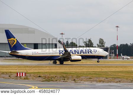 Ryanair Boeing 737-8as Takes Off From The Runway At Riga International Airport. Riga International A