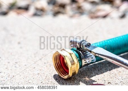 New Garden Hose Replacement Connection And Pipe Mender To Tighten And Secure Repair.