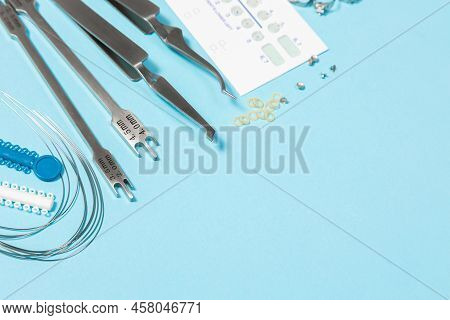 A Set Of Special Tools For An Orthodontist To Install Braces For A Patient. Orthodontic Arcs, Ligatu