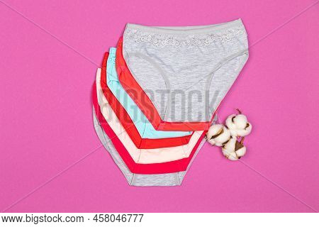 Clothes For Children In The Form Of Panties On A Pink Background. Clothes For Children From Soft Fab