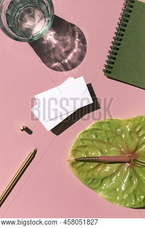 Business Card White Mosk Up On The Colorful Pink Background With Notepad, Pen, Tropical Flower And G
