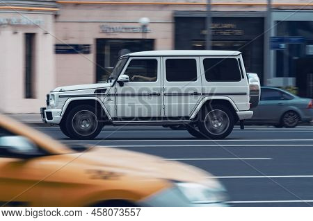 Mercedes Benz G Class W463 Model Car On The Street In Motion. Moscow, Russia - July 2022