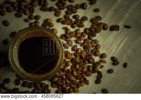 Black Roasted Coffee Beans. Cezva Cup Coffee Glass Rustic Style Turkish Ground Coffee