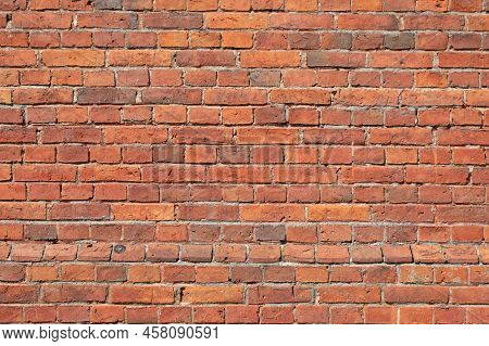The Surface Texture Of The Retro Red Brick Wal With Grey Concrete In The Gaps