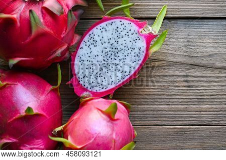 Fresh Dragon Fruit Tropical In The Asian Thailand Healthy Fruit Concept, Dragon Fruit Cut Half On Wo