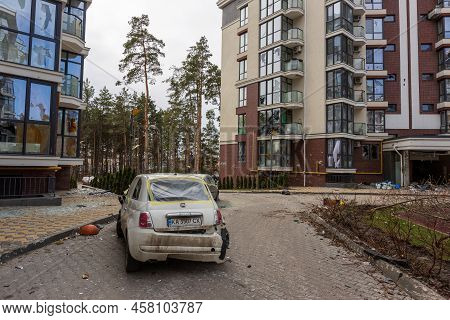 Hostomel, Kyev Region Ukraine - 09.04.2022: Shot Cars. On The Streets Of Irpin. Cities Of Ukraine Af