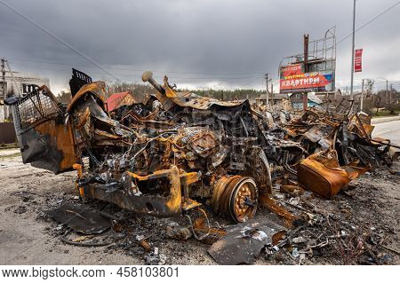 Hostomel, Kyev Region Ukraine - 09.04.2022: Burnt Military Vehicles Of Russian Soldiers On The Bridg