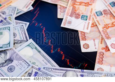Us Dollar And Russian Ruble Banknotes Over Digital Screen With Real Life Exchange Chart, Usd Rub Dep