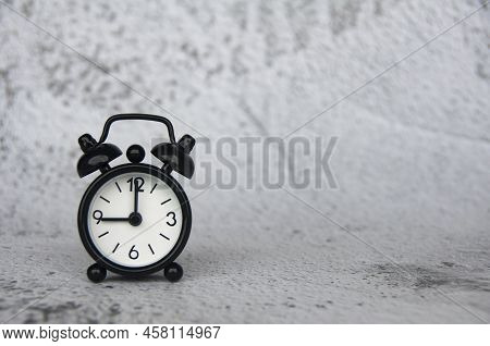 Alarm Clock Pointing At 9 Oclock With Customizable Space For Ideas Or Text. Copy Space.