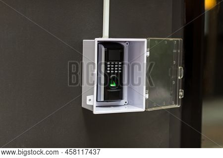 Finger Scan On Machine Security Concept And Safety. Soft Focus On Hand Scanning Finger On Machine Co