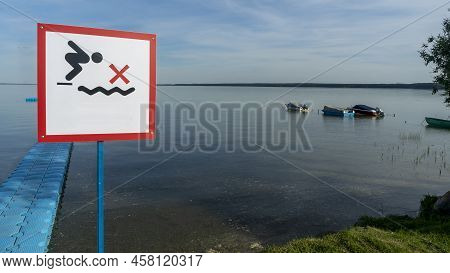No Diving Sign At Beach, Lake Naroch, Belarus. Warning Sign Of Shallow Water. Warning Notice Sign Do