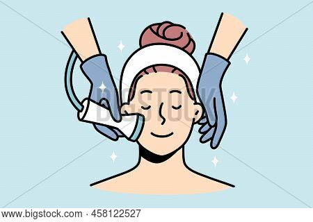 Woman Enjoy Face Skin Treatment In Saloon. Happy Calm Female Client Having Microdermabrasion Peeling