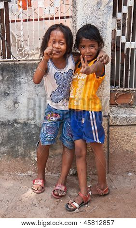 Two Young Girls Posing Outside In Siem Reap Cambodia